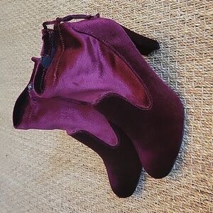 Burgundy velvet heeled booties.  Zipper up the side.  Size is 9.